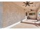 Covered back patio with ceiling fans and string lights at 4053 E Glencove St, Mesa, AZ 85205