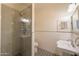 Updated bathroom with glass shower and pedestal sink at 4053 E Glencove St, Mesa, AZ 85205