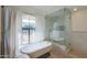 Bathroom boasts a soaking tub and a walk-in shower at 4053 E Glencove St, Mesa, AZ 85205