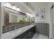 Elegant bathroom with double vanity and patterned tile at 4053 E Glencove St, Mesa, AZ 85205