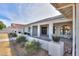 Inviting front porch with brick flooring and lush landscaping at 4053 E Glencove St, Mesa, AZ 85205