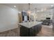 Kitchen with large island and white shaker cabinets at 4053 E Glencove St, Mesa, AZ 85205