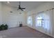 Large spare bedroom with neutral carpeting and two windows at 4053 E Glencove St, Mesa, AZ 85205