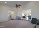 Spacious bedroom with a view of the living room and entryway at 4053 E Glencove St, Mesa, AZ 85205