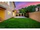 Large backyard with patio and block wall at 41 E Caroline Ln, Tempe, AZ 85284