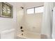 Clean bathroom with a tub shower, and updated fixtures at 41 E Caroline Ln, Tempe, AZ 85284