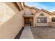 Home exterior featuring a walkway to a double-door entry at 41 E Caroline Ln, Tempe, AZ 85284