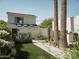 Landscaped backyard oasis with modern additions at 61 W Wilshire Dr, Phoenix, AZ 85003