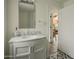 Modern bathroom with marble vanity, updated fixtures, and stylish tile floor at 61 W Wilshire Dr, Phoenix, AZ 85003