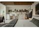 Main bedroom with built-in workspace and exposed beams at 61 W Wilshire Dr, Phoenix, AZ 85003