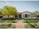 Charming Spanish-style home with landscaped front yard at 61 W Wilshire Dr, Phoenix, AZ 85003