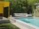 Inviting pool with patterned tile and modern seating at 61 W Wilshire Dr, Phoenix, AZ 85003