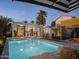 Inviting swimming pool with a spacious patio and lounge area at 61 W Wilshire Dr, Phoenix, AZ 85003