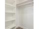 Spacious closet with built-in shelving and hanging rod at 619 E Jensen St # 55, Mesa, AZ 85203