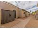 Exterior view of home with storage shed and side yard at 619 E Jensen St # 55, Mesa, AZ 85203