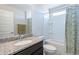 Clean bathroom with granite countertop and shower/tub combo at 7067 W Maya Way, Peoria, AZ 85383