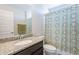 Clean bathroom with granite countertop and shower/tub combo at 7067 W Maya Way, Peoria, AZ 85383