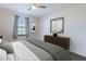 Bright bedroom with a comfortable bed and dresser at 7067 W Maya Way, Peoria, AZ 85383