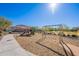 Playground with swings and playset in a community setting at 7067 W Maya Way, Peoria, AZ 85383