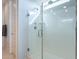 Large walk-in shower with glass enclosure and window at 7067 W Maya Way, Peoria, AZ 85383