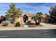 One-story house with stucco exterior, tile roof, and desert landscaping at 7710 E Monica Dr, Scottsdale, AZ 85255