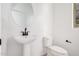 Simple bathroom with pedestal sink and oval mirror at 9242 E Sector Dr, Mesa, AZ 85212