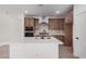 Modern kitchen with island and double oven at 9242 E Sector Dr, Mesa, AZ 85212