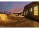 Evening view of backyard, showing pathway and landscaping at 13271 E Desert Vista Rd, Scottsdale, AZ 85255