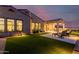 Outdoor patio area with seating and artificial turf at 13271 E Desert Vista Rd, Scottsdale, AZ 85255