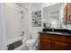 Modern bathroom with a soaking tub, shower, and dark vanity at 13271 E Desert Vista Rd, Scottsdale, AZ 85255