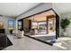 Open floor plan with glass doors leading to a relaxing outdoor patio at 13271 E Desert Vista Rd, Scottsdale, AZ 85255