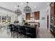 Open concept kitchen with large island, stainless steel appliances, and dark wood cabinetry at 13271 E Desert Vista Rd, Scottsdale, AZ 85255