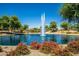 Water fountain in a community with lush landscaping at 15797 W Remington Dr, Surprise, AZ 85374