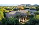 Luxury home with pool and landscaped yard; mountain views at 9053 N 46Th St, Phoenix, AZ 85028