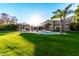 Spacious backyard with a pool, patio, and lush grass at 9053 N 46Th St, Phoenix, AZ 85028