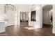 Bright and spacious entryway with hardwood floors and views to the living room at 9053 N 46Th St, Phoenix, AZ 85028