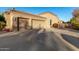 Two-car garage with large driveway and gated entry at 9053 N 46Th St, Phoenix, AZ 85028