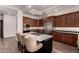 Spacious kitchen with island, stainless steel appliances, and hardwood floors at 9053 N 46Th St, Phoenix, AZ 85028