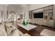 Bright living room with hardwood floors and built-in shelving at 9053 N 46Th St, Phoenix, AZ 85028