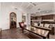 Open living area with vaulted ceilings,wine room and kitchen access at 9053 N 46Th St, Phoenix, AZ 85028