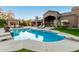 Resort-style pool with patio and outdoor seating area at 9053 N 46Th St, Phoenix, AZ 85028