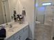 Bathroom with single sink vanity, shower, and toilet at 9253 N Firebrick Dr # 210, Fountain Hills, AZ 85268