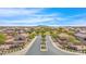 Aerial view of community entrance with signage and landscaping at 1650 E Kingman Pl, Casa Grande, AZ 85122