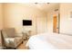 Bedroom with a double bed, chair, and closet at 21655 N 36Th Ave # 117, Glendale, AZ 85308