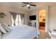 Spacious bedroom with ensuite bathroom and private balcony access at 21655 N 36Th Ave # 117, Glendale, AZ 85308