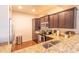 Modern kitchen with stainless steel appliances and granite countertops at 21655 N 36Th Ave # 117, Glendale, AZ 85308