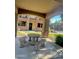Community patio with seating area and views of the community at 21655 N 36Th Ave # 117, Glendale, AZ 85308