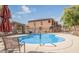 Inviting community pool with ample lounge space and shade at 21655 N 36Th Ave # 117, Glendale, AZ 85308