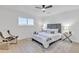 Bedroom with a large window, and accent chair at 2364 W Emelita Ave, Mesa, AZ 85202