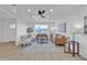 Open concept view of the living room. Shows flooring, fixtures and furniture at 2364 W Emelita Ave, Mesa, AZ 85202